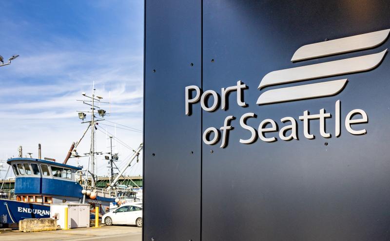 Port of Seattle sign on Maritime Innovation Center overlooking marina.