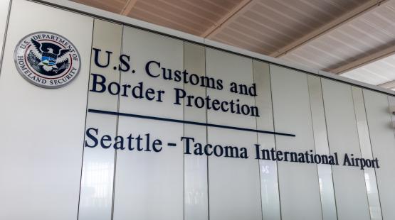 U.S. Customs and Border Protection sign at the International Arrivals Facility (IAF) at Seattle-Tacoma International Airport