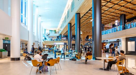 C Concourse area with several stories of shops and restaurants with large open area for seating
