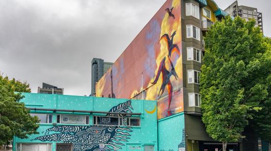 "Luna" and "Jurassic Park" murals brighten an intersection in Belltown.