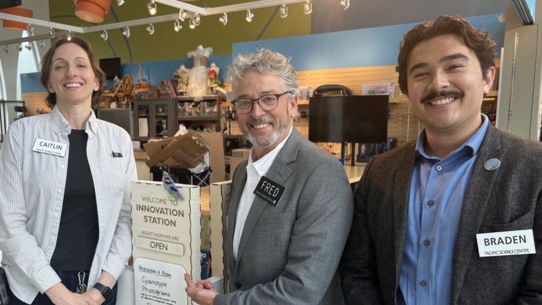 Commissioner Felleman with Pacific Science Center employees Caitlin and Braden.