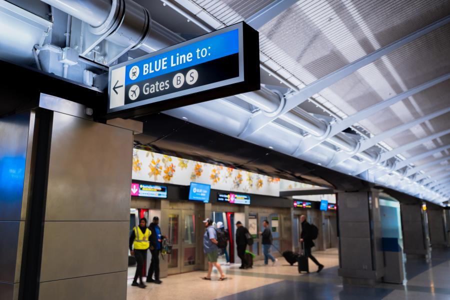 Sign for SEA Underground blue line to Gates B, and S