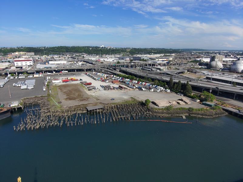 Wide aerial shot of Terminal 25 showing shoreline and property.