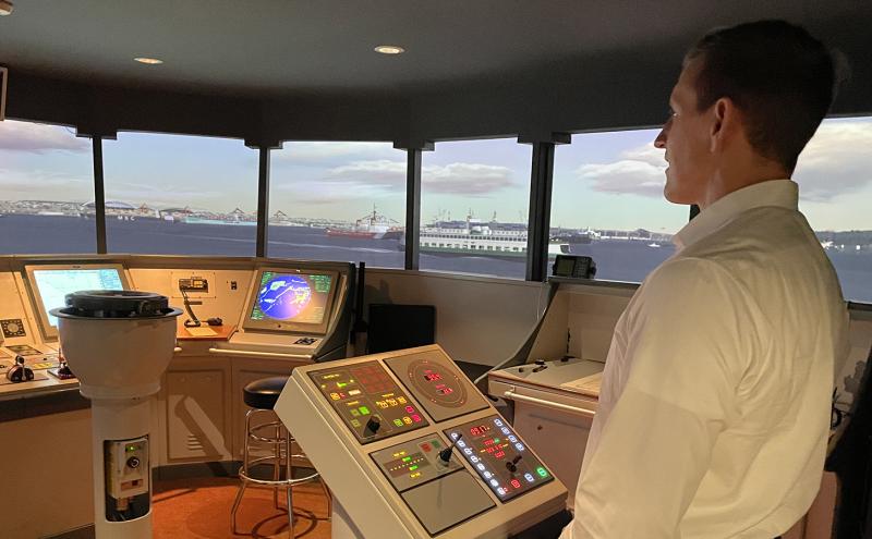 Commissioner Ryan Calkins on the vessel piloting simulator at the Maritime Institute of Tech. and Grad Studies October 2021