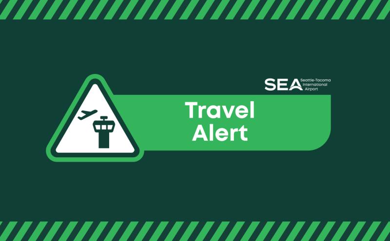 Graphic logo including the SEA Airport logo and the words Travel Alert