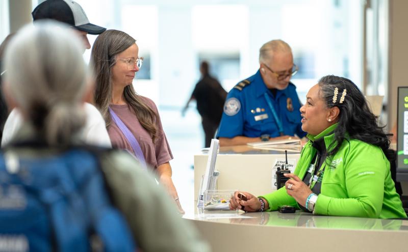 A pathfinder speaking with customers 