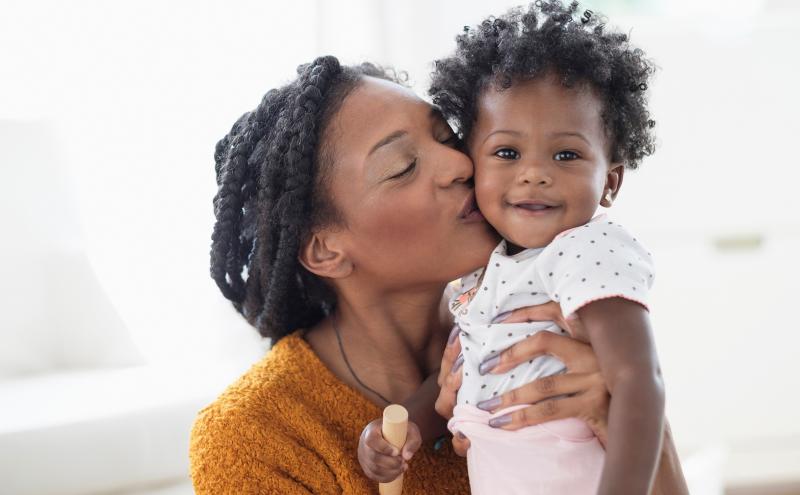 Stock photo of woman and baby