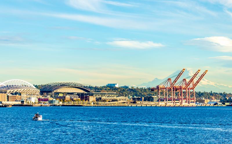 Elliott Bay and the southern Seattle waterfront with Mount Rainier in the background
