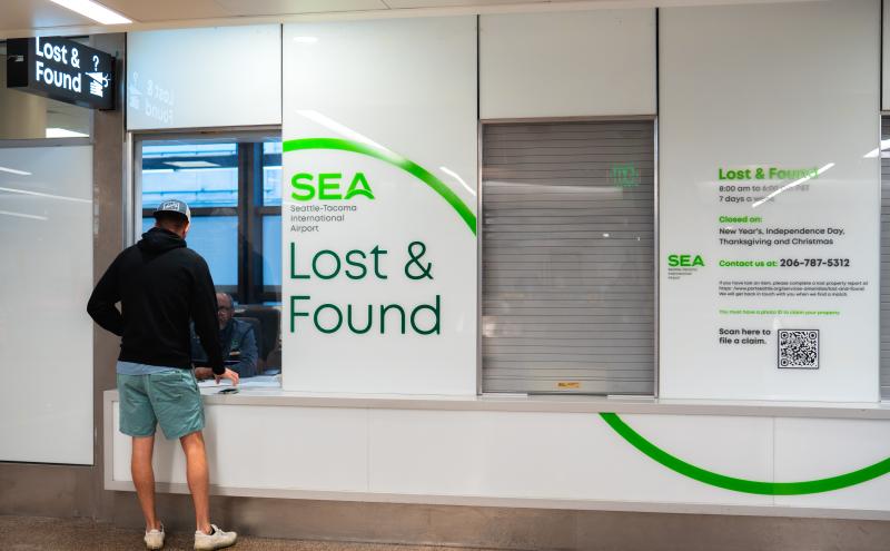 Customer getting help at Lost and Found