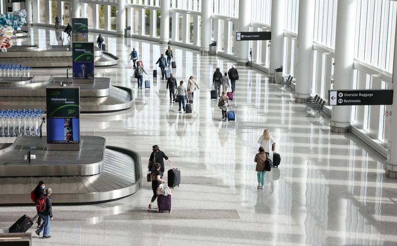 Travelers in Baggage Claim